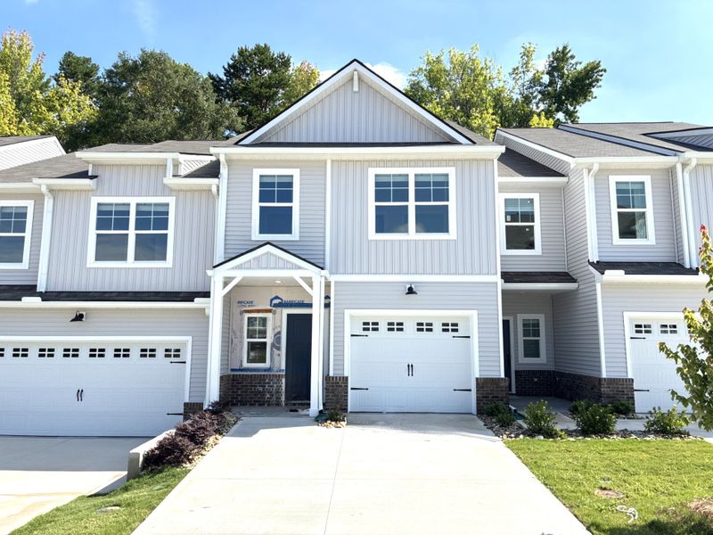 Front exterior of a new home in Miller Park, Greenville, SC, highlighting curb appeal (Image 1). Front exterior of a new home in Miller Park, Greenville, SC, highlighting curb appeal (Image 1).