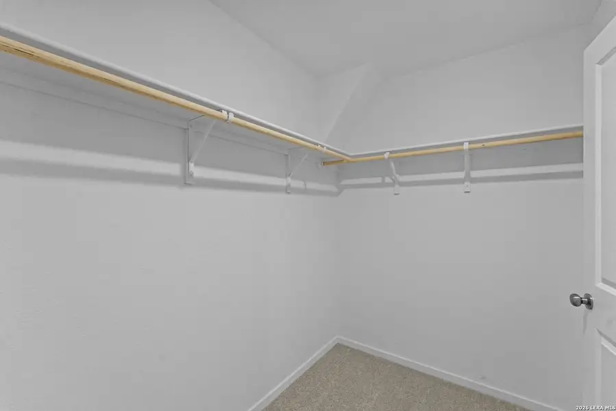 Spacious, unfurnished interior of a new home in Hidden Oasis, San Antonio (Image 22).