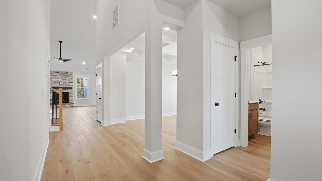 Superior design begins at the front door with a hardwood floor foyer and elegant sightlines located in Greenville, SC