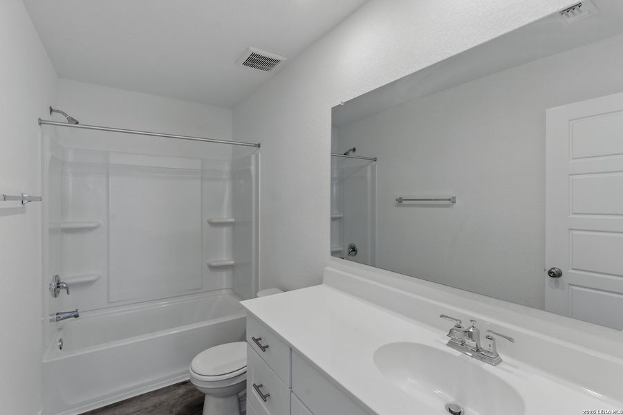 Furnished interior view inside a new home in , New Braunfels (Image 12).