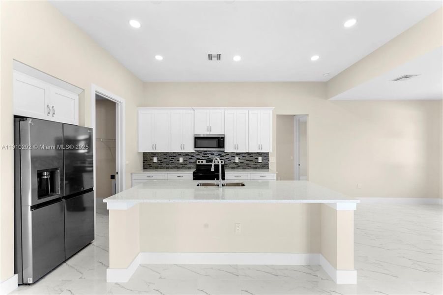 Furnished interior view inside a new home in , Lehigh Acres (Image 7).