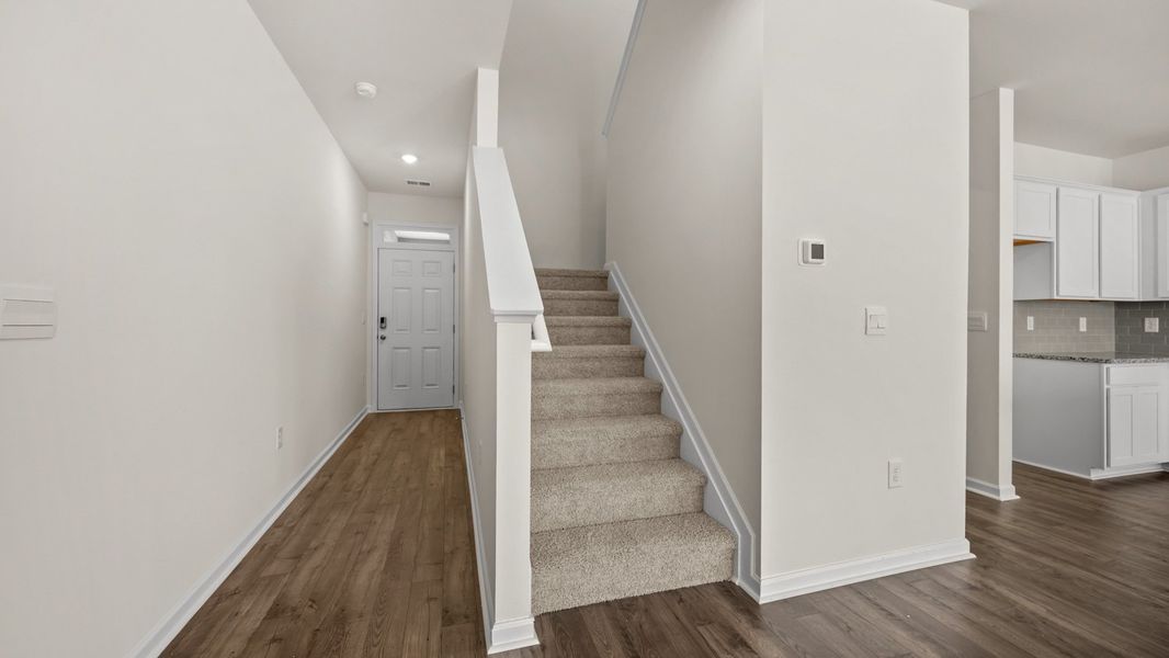 Representative unfurnished interior of a home built from the Salisbury by D.R. Horton in Inverness at Sugarloaf, Lawrenceville (Image 21).