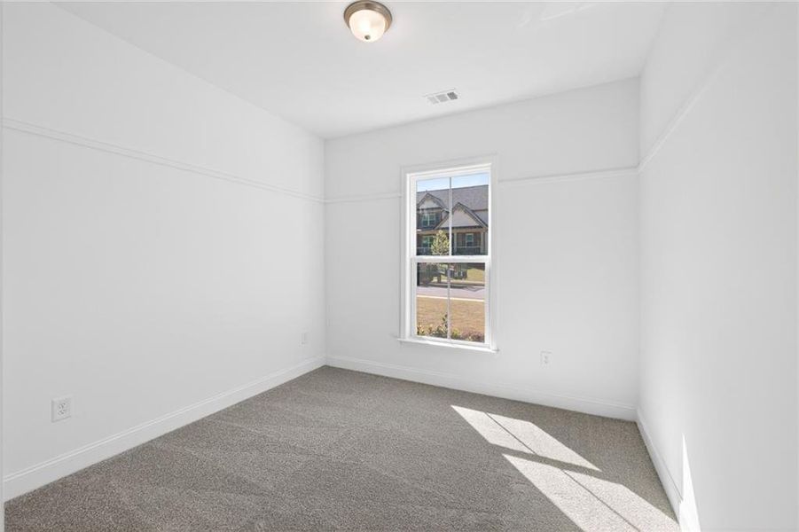 Spacious, unfurnished interior of a new home in Riversprings, Dacula (Image 38).