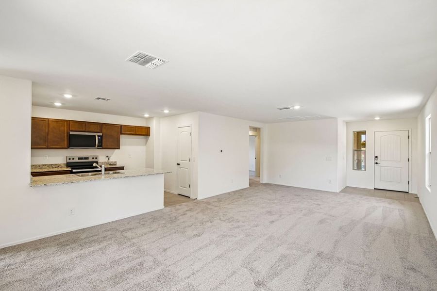 Spacious, unfurnished interior of a new home in Mandarina Reserve, Marana (Image 12). Spacious, unfurnished interior of a new home in Mandarina Reserve, Marana (Image 12).