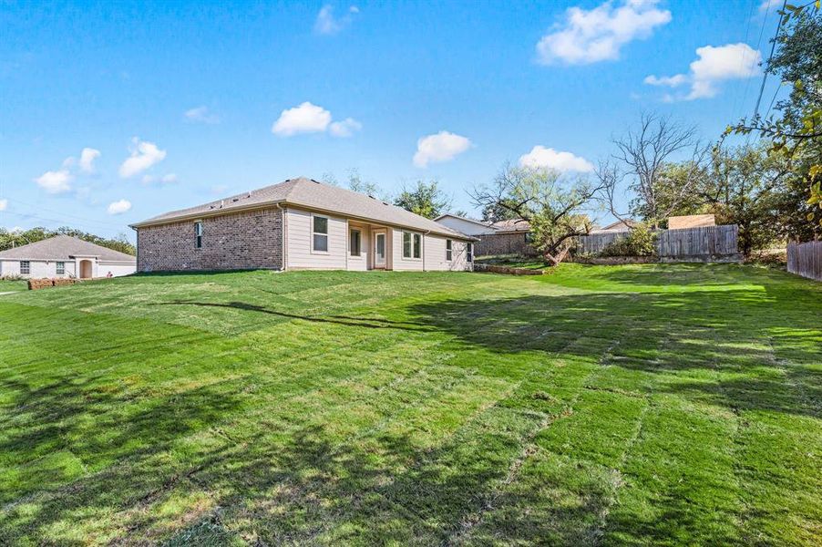 Exterior details and patio area of a home in Runaway Bay, Runaway Bay (Image 23).