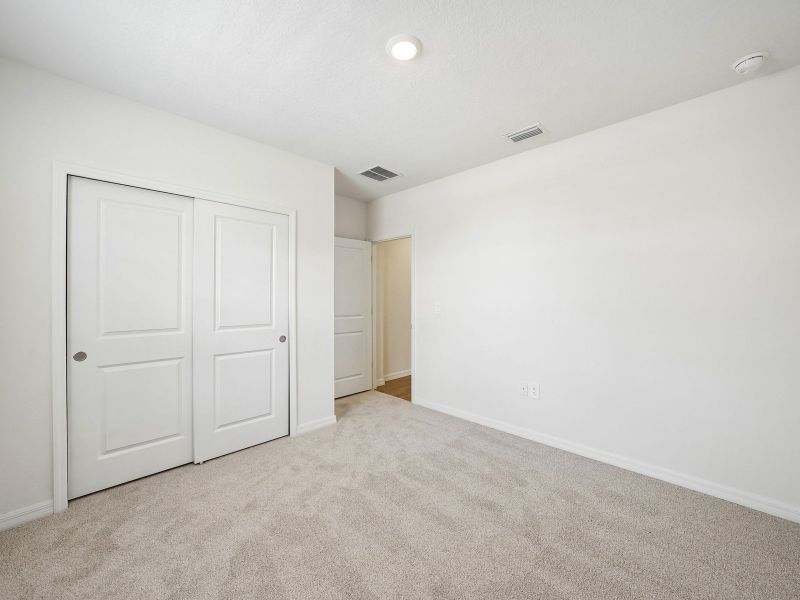 Spacious, unfurnished interior of a new home in The Grove at Stuart Crossing - Classic Series, Bartow (Image 16). Spacious, unfurnished interior of a new home in The Grove at Stuart Crossing - Classic Series, Bartow (Image 16).