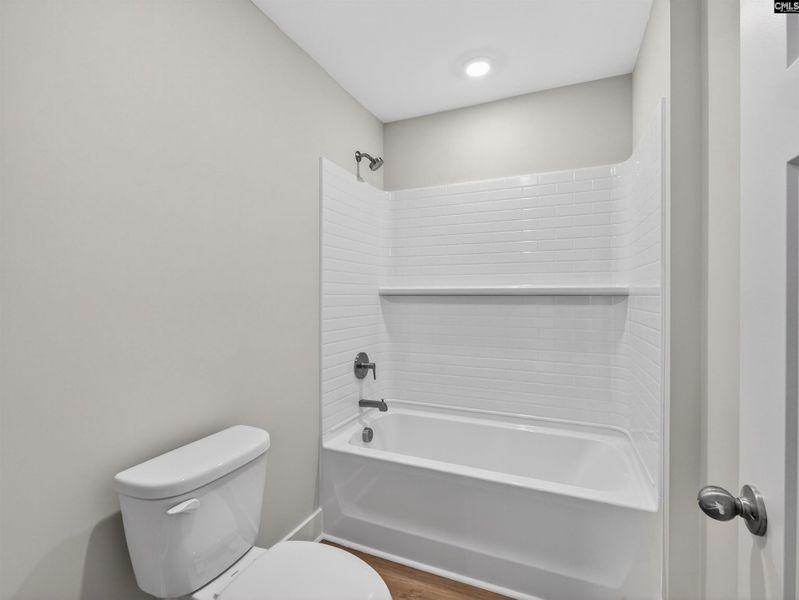 Furnished interior view inside a new home in Collins Cove, Chapin (Image 19).