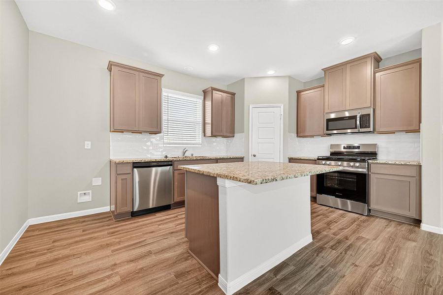 Furnished interior view inside a new home in Sunterra, Katy (Image 17).