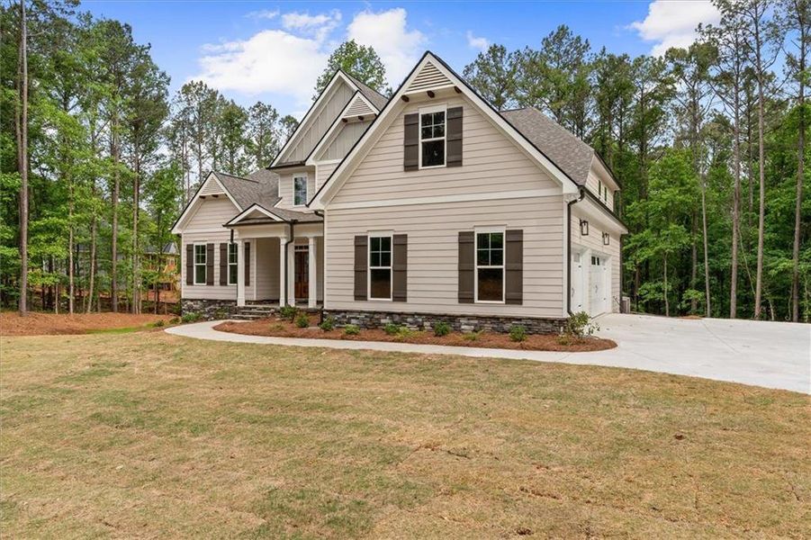 Front exterior of a new home in , Winston, GA, highlighting curb appeal (Image 7). Front exterior of a new home in , Winston, GA, highlighting curb appeal (Image 7).