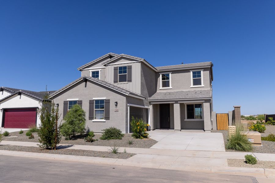 Front exterior of a new home in Rancho Santa Rosa, Maricopa, AZ, highlighting curb appeal (Image 2).