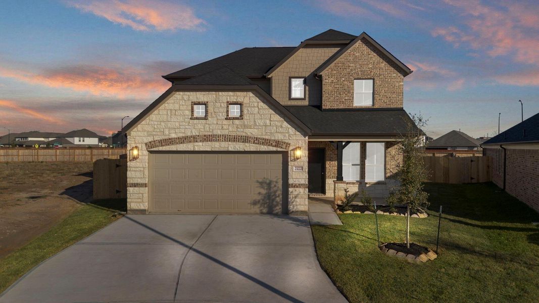 Front exterior of a new home in Morton Creek Ranch, Katy, TX, highlighting curb appeal (Image 20).