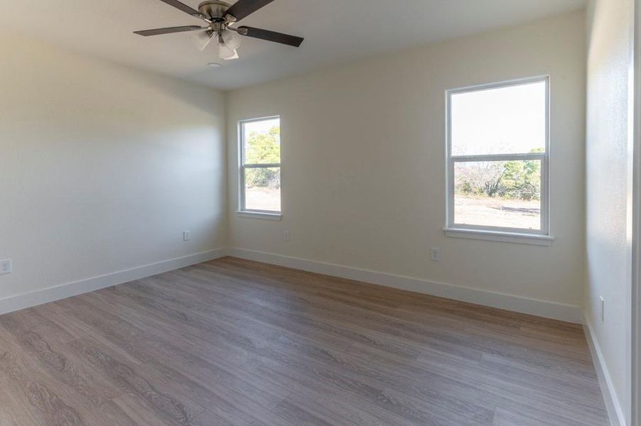 Unfurnished room with wood finished floors