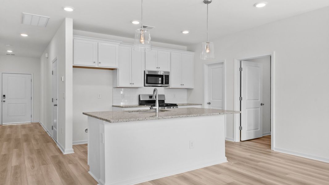 Representative furnished interior of a home built from the Boynton III by DRB Homes in Bluffs at Sun Colony, Longs (Image 10).