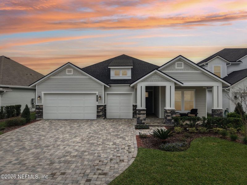 Front exterior of a new home in Middlebourne, St. Johns, FL, highlighting curb appeal (Image 25).