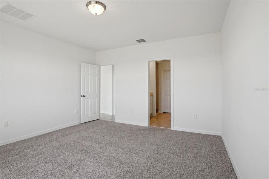 Spacious, unfurnished interior of a new home in Lake Deer Estates - Signature Series, Poinciana (Image 18). Spacious, unfurnished interior of a new home in Lake Deer Estates - Signature Series, Poinciana (Image 18).