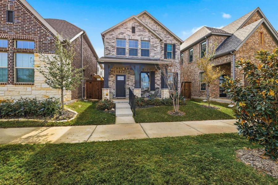 Front exterior of a new home in Ashford Park - Cottage Series, Corinth, TX, highlighting curb appeal (Image 1).