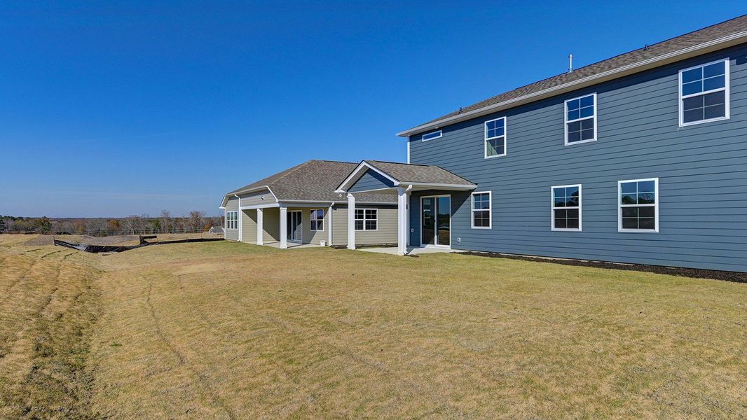 Exterior details and patio area of a home in Livingston Woods, Irmo (Image 31). Exterior details and patio area of a home in Livingston Woods, Irmo (Image 31).