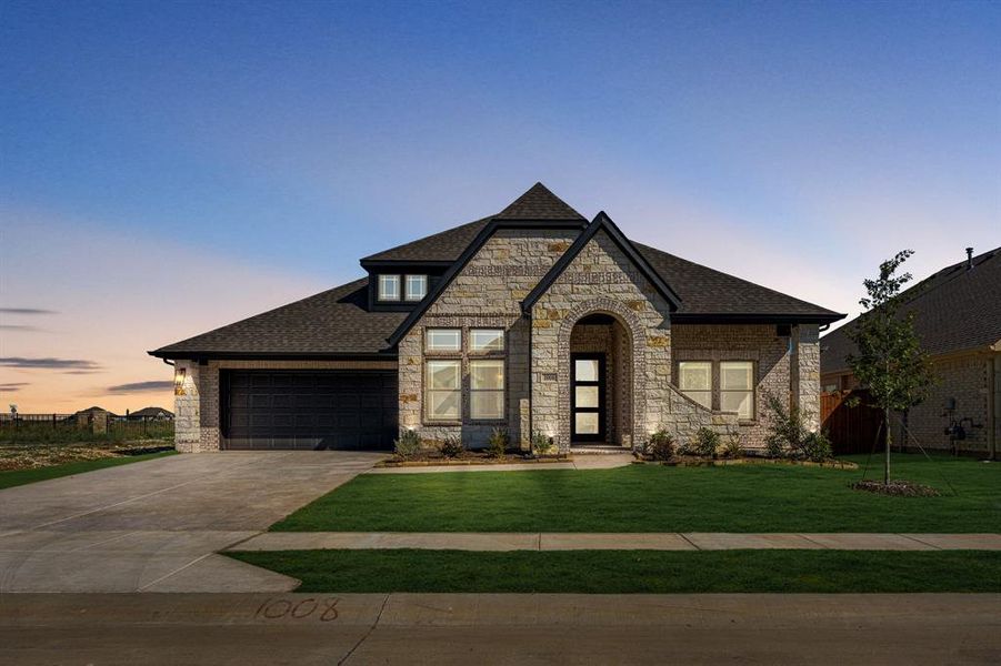 Front exterior of a new home in Timberbrook 3B-4A, Justin, TX, highlighting curb appeal (Image 1).