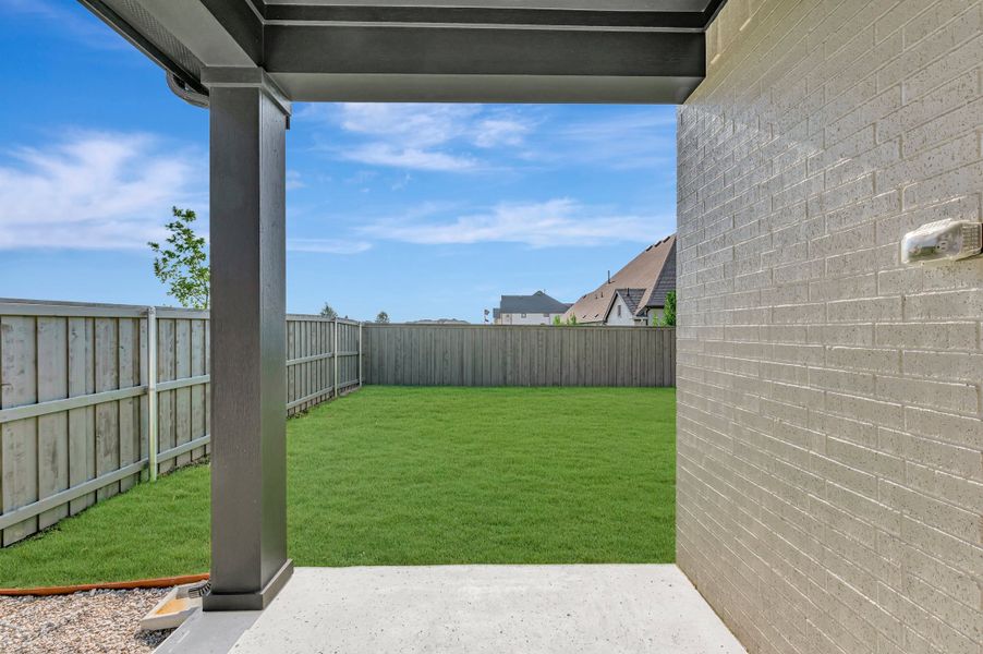 Exterior details and patio area of a home in Goodland – Classic Series, Grand Prairie (Image 4).