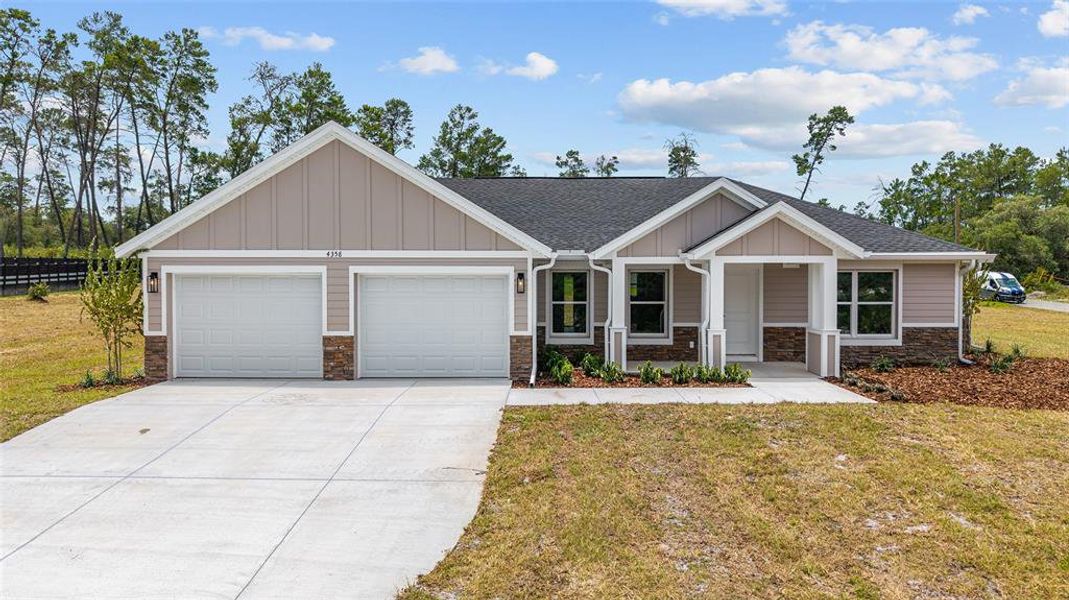 Front exterior of a new home in , Dunnellon, FL, highlighting curb appeal (Image 25). Front exterior of a new home in , Dunnellon, FL, highlighting curb appeal (Image 25).