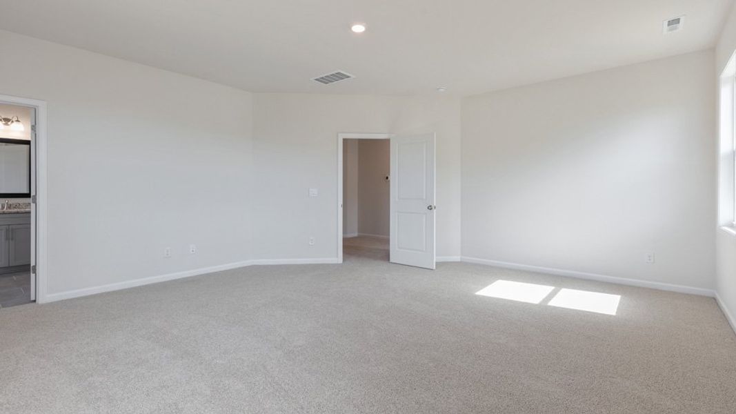 Spacious, unfurnished interior of a new home in The Manors at Winston Pointe, Clayton (Image 20).