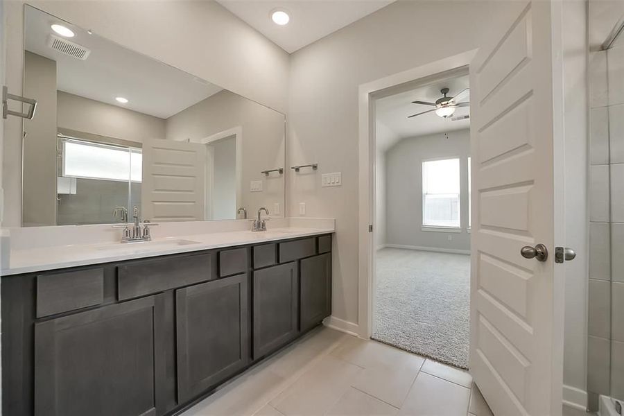 Furnished interior view inside a new home in Sunterra, Katy (Image 38).