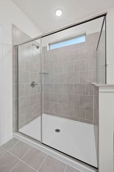 Primary Bath in the Elm home plan by Trophy Signature Homes – REPRESENTATIVE PHOTO