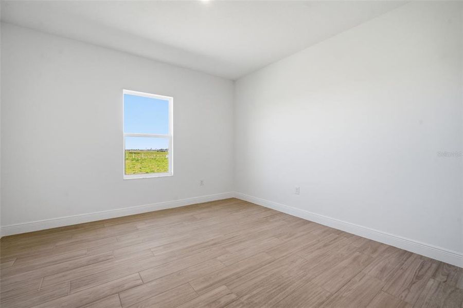 Spacious, unfurnished interior of a new home in Coasterra, Palmetto (Image 39).