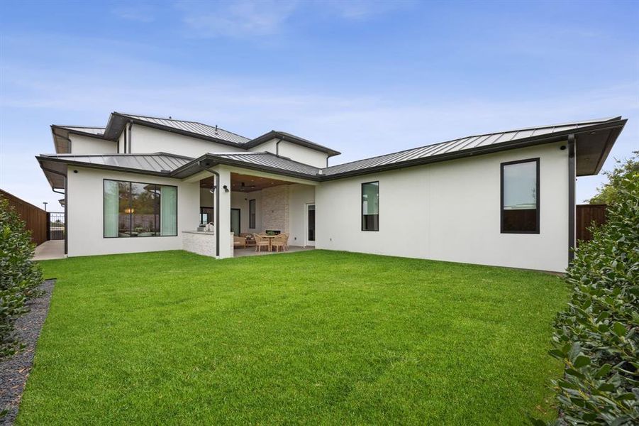 Exterior details and patio area of a home in Avadene at Las Colinas, Irving (Image 4).