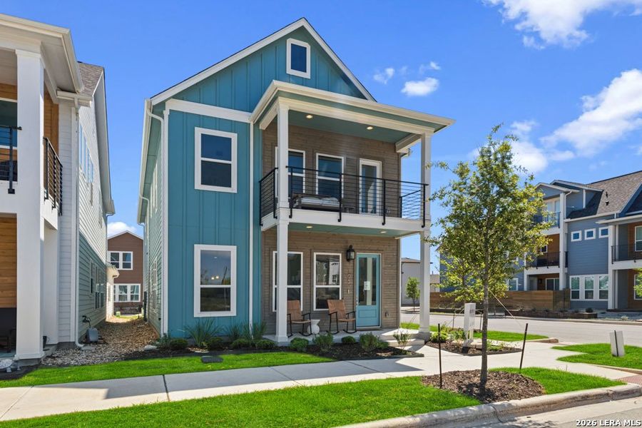 Front exterior of a new home in Town Creek, New Braunfels, TX, highlighting curb appeal (Image 2). Front exterior of a new home in Town Creek, New Braunfels, TX, highlighting curb appeal (Image 2).