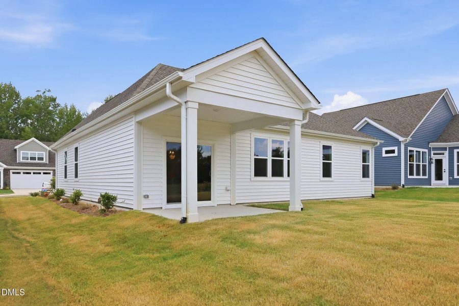 Exterior details and patio area of a home in The Cottages at 78 North, Sanford (Image 4).
