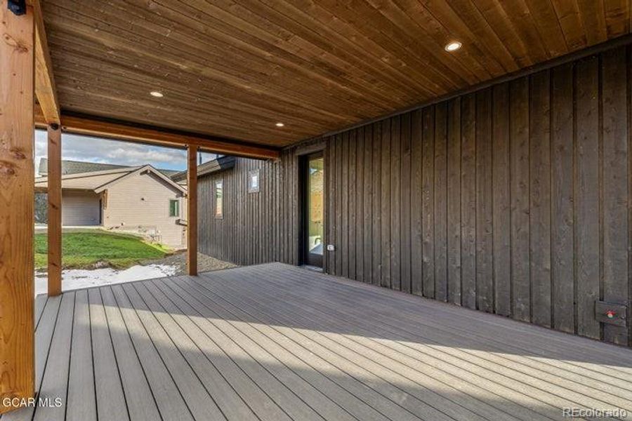 Exterior details and patio area of a home in , Granby (Image 26).