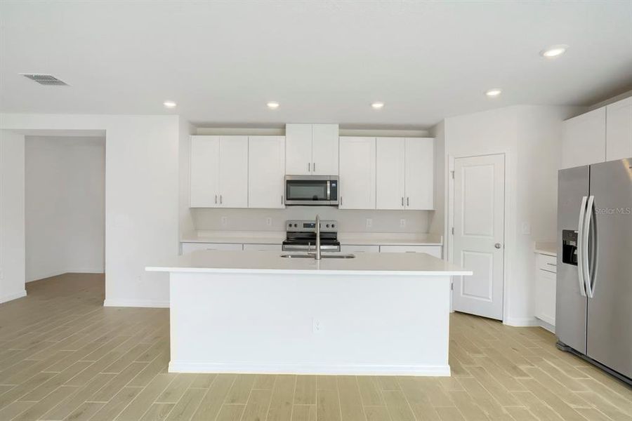 Furnished interior view inside a new home in Salt Meadows - Classic Series, Parrish (Image 12).