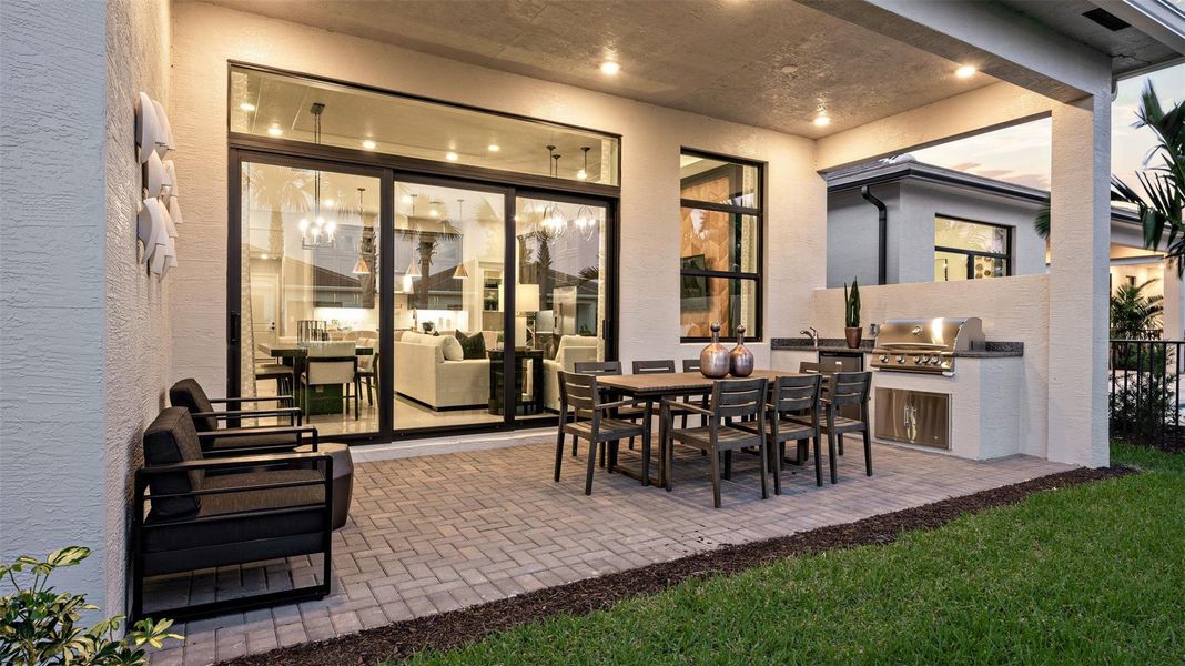 Exterior details and patio area of a home in Cresswind Palm Beach at Westlake, Westlake (Image 23).