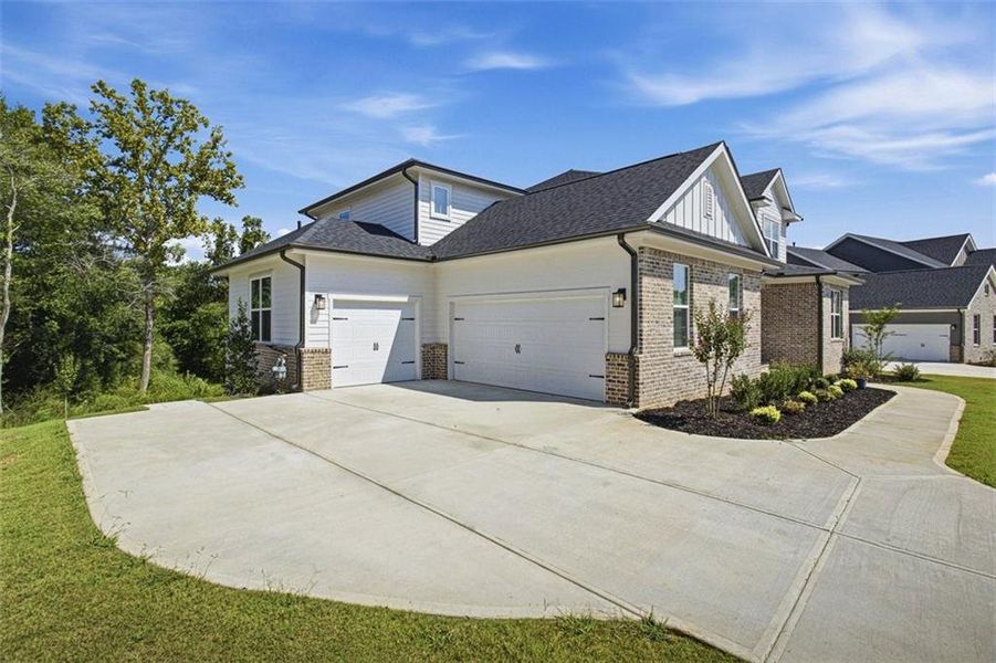 Front exterior of a new home in Conner Farm, Dawsonville, GA, highlighting curb appeal (Image 22).