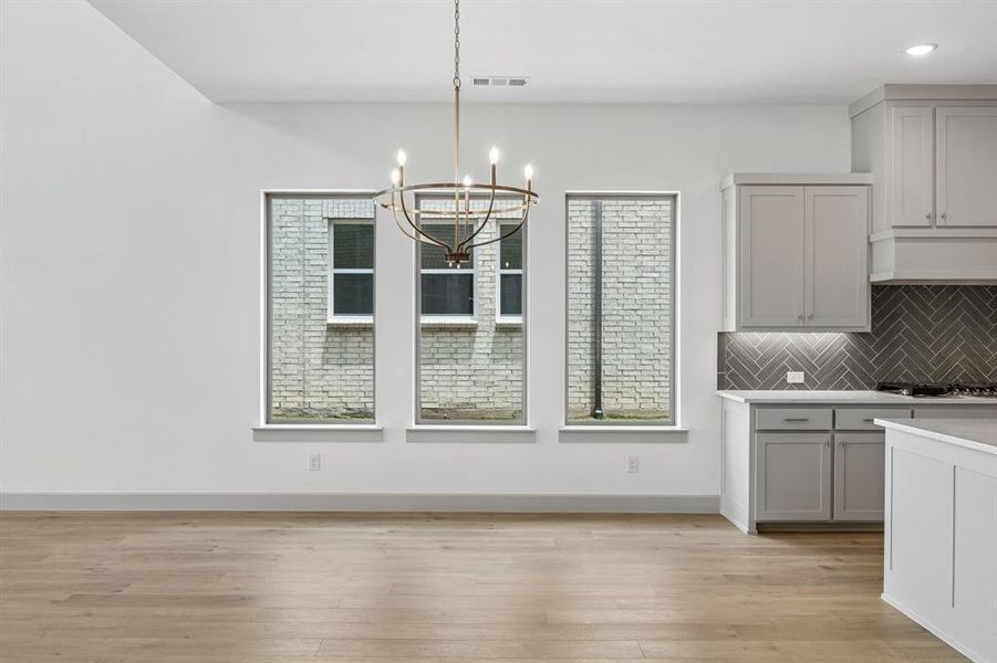 Whether it's grand dinner parties or cozy family meals, this dining room is perfect for any occasion! Whether it's grand dinner parties or cozy family meals, this dining room is perfect for any occasion!