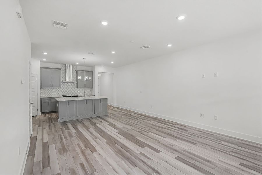 Representative unfurnished interior of a home built from the Newton by Rockwell Homes in Harvest at Ovation - Townhomes, Winter Garden (Image 64). Representative unfurnished interior of a home built from the Newton by Rockwell Homes in Harvest at Ovation - Townhomes, Winter Garden (Image 64).