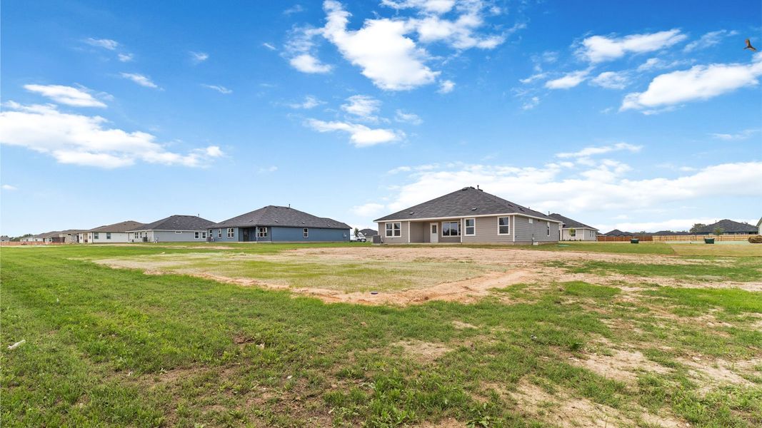 Exterior details and patio area of a home in Railhead, Cedar Creek (Image 19). Exterior details and patio area of a home in Railhead, Cedar Creek (Image 19).