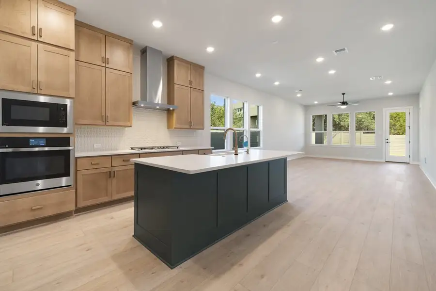 Furnished interior view inside a new home in Arbor Collection At Wolf Ranch, Georgetown (Image 5).