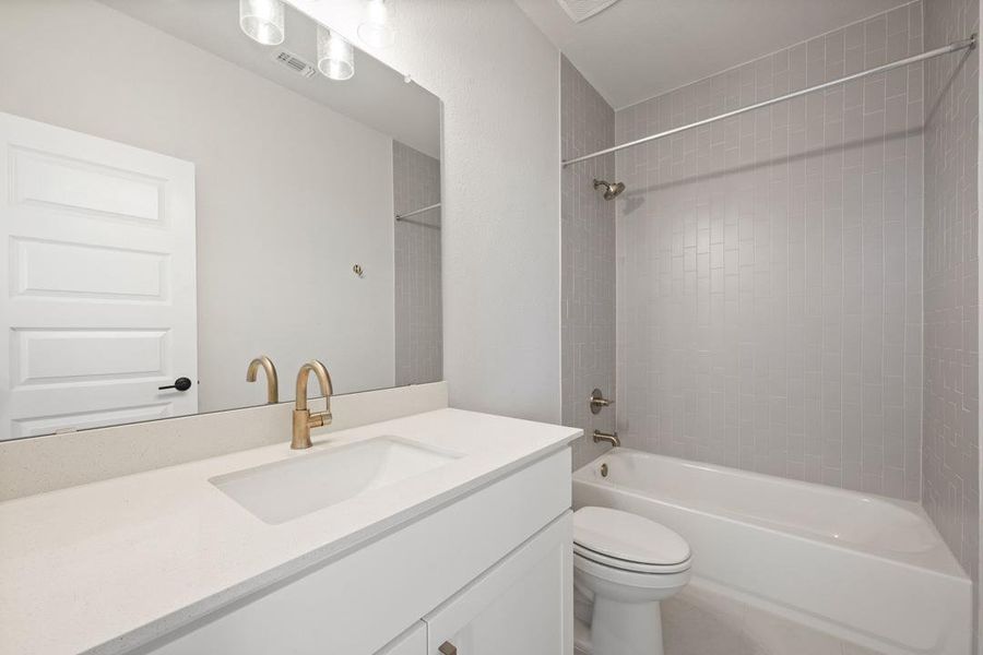 Furnished interior view inside a new home in Terrace Collection At Turner's Crossing, Buda (Image 10).