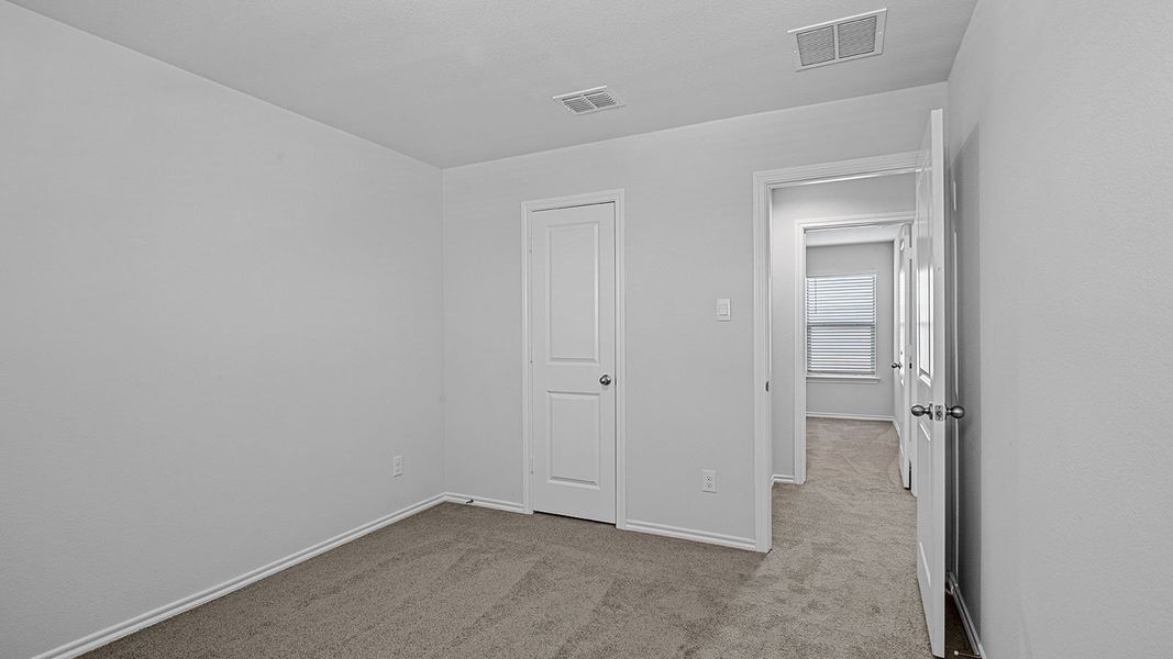 Spacious, unfurnished interior of a new home in Springhill South, Boyd (Image 32).