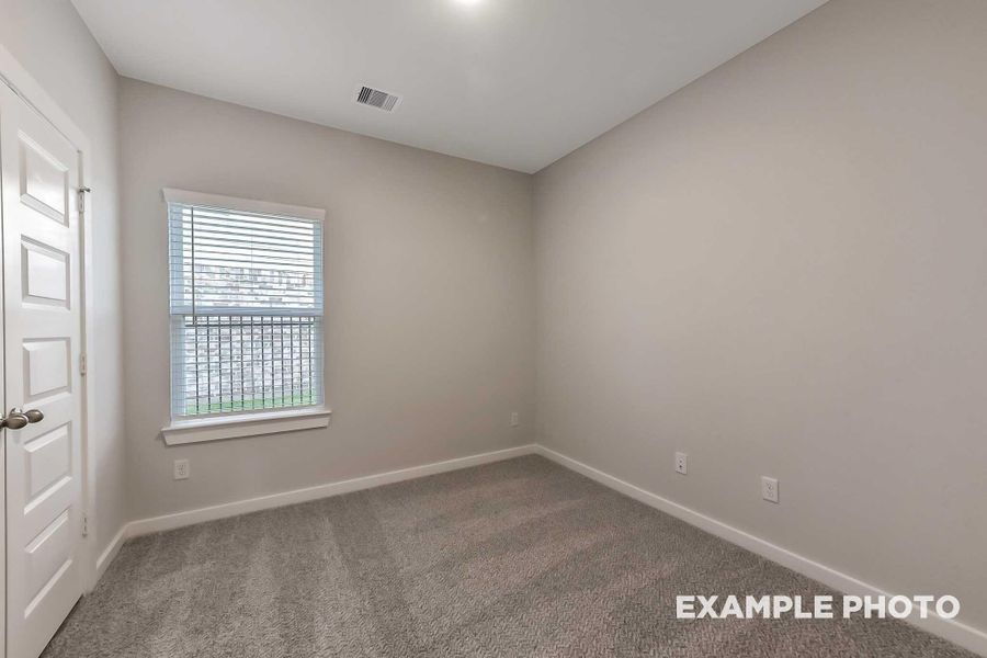 Spacious, unfurnished interior of a new home in Sunterra, Katy (Image 13).