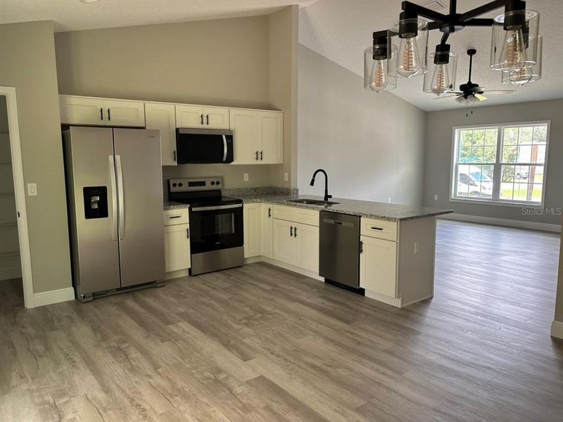 Furnished interior view inside a new home in , Dunnellon (Image 6).