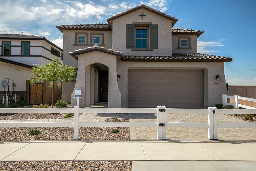 Front exterior of a new home in Mesquite at North Creek, Queen Creek, AZ, highlighting curb appeal (Image 24). Front exterior of a new home in Mesquite at North Creek, Queen Creek, AZ, highlighting curb appeal (Image 24).