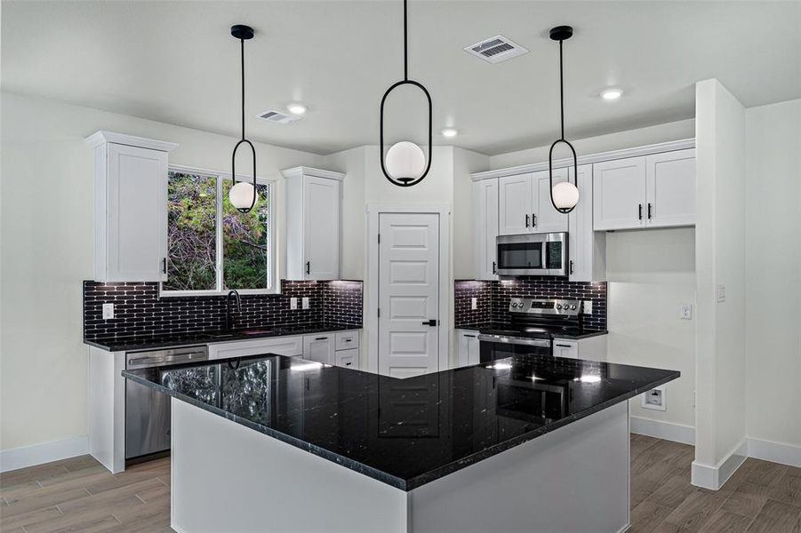 Furnished interior view inside a new home in , Granbury (Image 9).