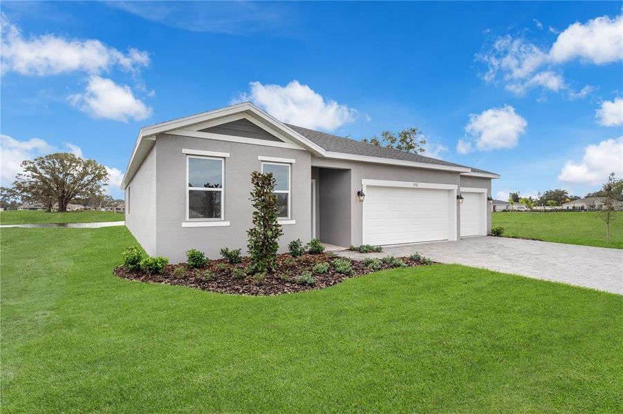 Front exterior of a new home in Country Club Estates, Palm Bay, FL, highlighting curb appeal (Image 21). Front exterior of a new home in Country Club Estates, Palm Bay, FL, highlighting curb appeal (Image 21).