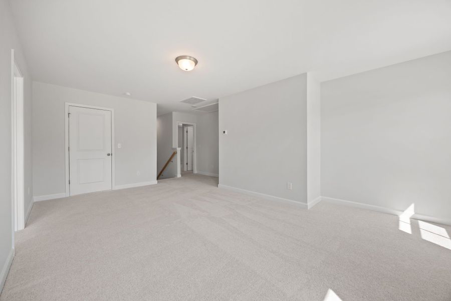 Representative unfurnished interior of a home built from the The Ashport B by Davidson Homes LLC in Saddle Creek Ranch, Cibolo (Image 27).