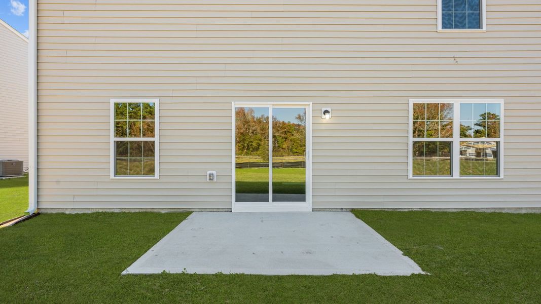 Exterior details and patio area of a home in Madeline Farm, New Bern (Image 4).