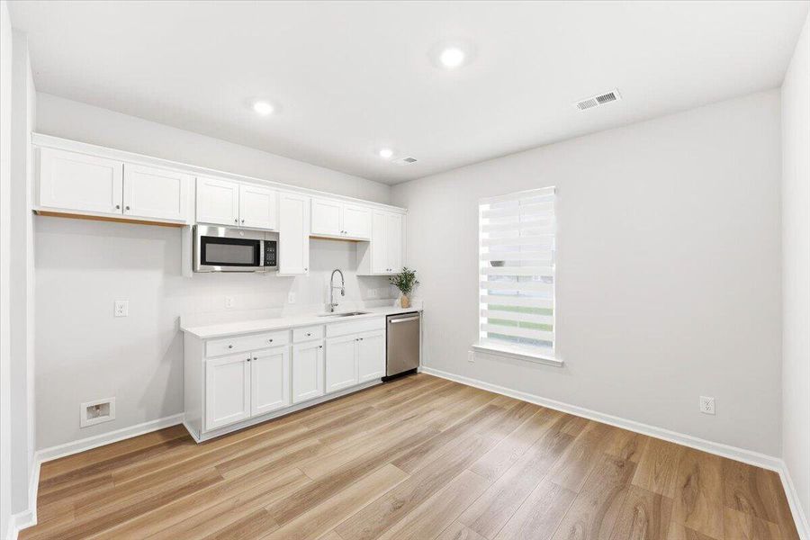 Furnished interior view inside a new home in Limehouse Village: Arbor Series, Summerville (Image 48).