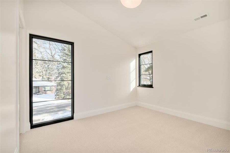 Secondary bedroom with an en-suite bathroom